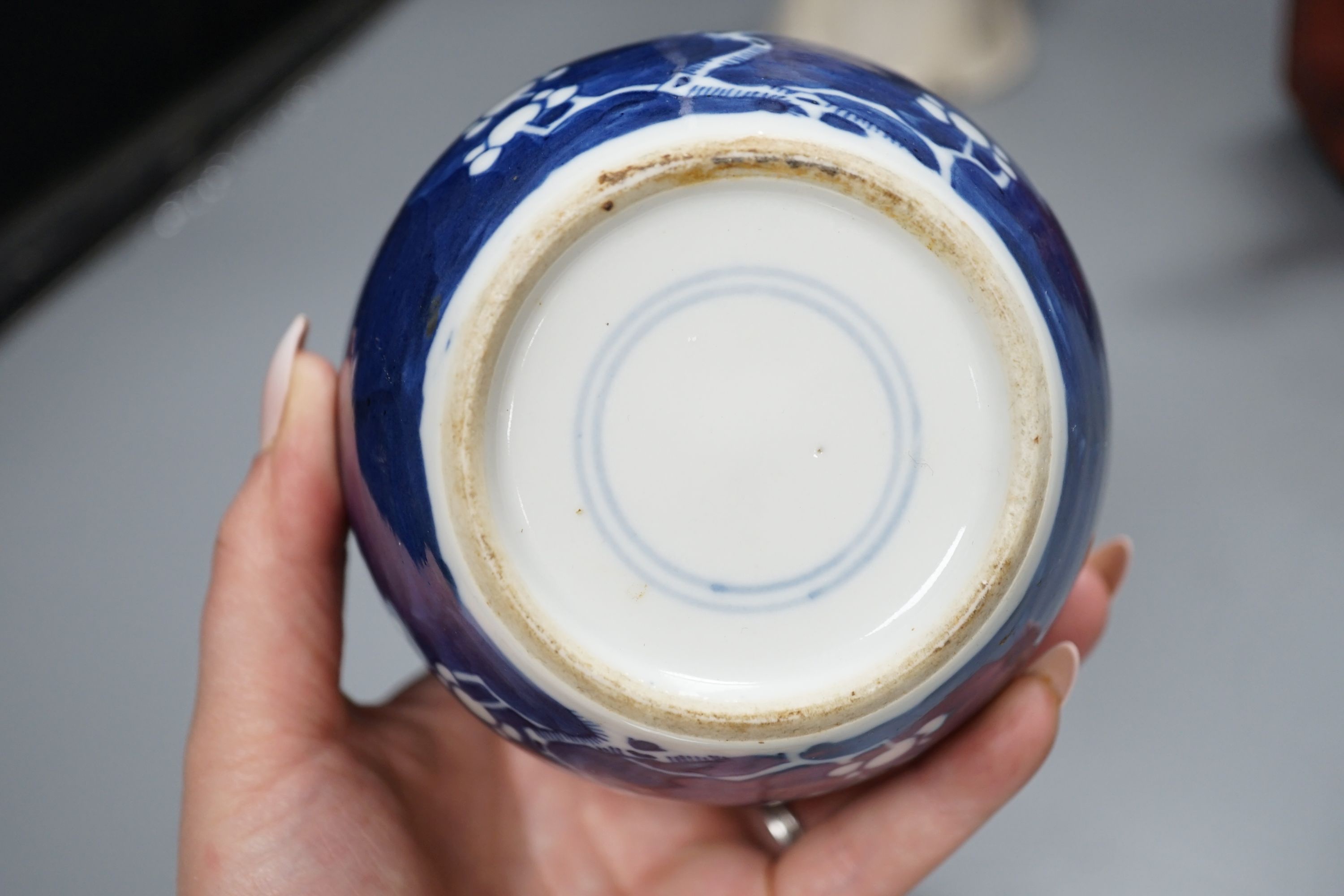 A Chinese blanc de chin figure of a lady with a bird, 37cm, together with a famille rose teapot, a yixing style teapot, blue and white jar and cover and a pale celadon ground ‘ox head’ libation cup